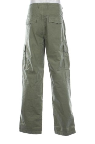 Pánske nohavice  Tommy Jeans, Veľkosť XL, Farba Zelená, Cena  38,00 €