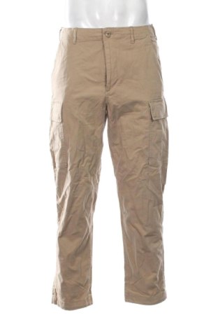 Męskie spodnie Uniqlo, Rozmiar M, Kolor Beżowy, Cena 129,99 zł