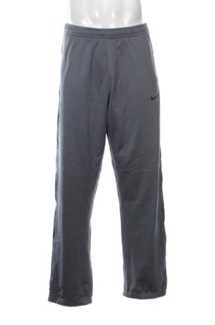 Męskie spodnie sportowe Nike, Rozmiar L, Kolor Szary, Cena 117,99 zł