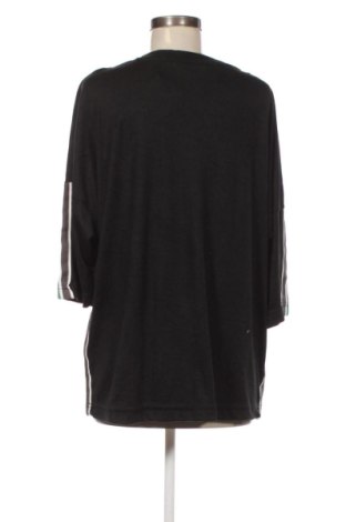 Γυναικείο t-shirt Janina, Μέγεθος XL, Χρώμα Μαύρο, Τιμή 8,99 €