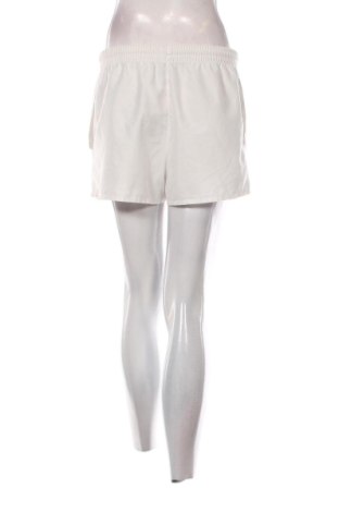 Γυναικείο κοντό παντελόνι Budmil, Μέγεθος L, Χρώμα Λευκό, Τιμή 8,75 €