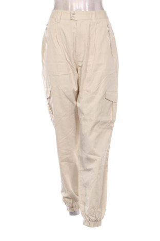 Női nadrág Tommy Jeans, Méret M, Szín Bézs, Ár 51 159 Ft