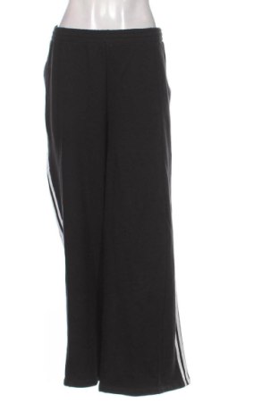 Damskie spodnie sportowe Adidas, Rozmiar L, Kolor Czarny, Cena 110,99 zł