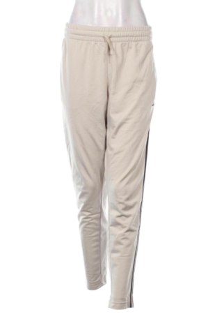 Damskie spodnie sportowe Adidas, Rozmiar L, Kolor Kolorowy, Cena 250,99 zł