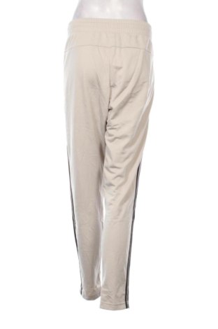 Damskie spodnie sportowe Adidas, Rozmiar L, Kolor Kolorowy, Cena 250,99 zł