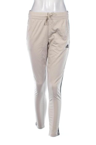 Damskie spodnie sportowe Adidas, Rozmiar M, Kolor Beżowy, Cena 250,99 zł
