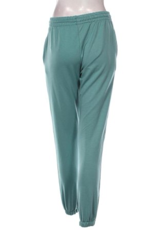 Damen Sporthose Karaca, Größe L, Farbe Grün, Preis 27,68 €