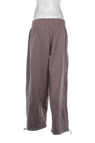 Γυναικείο αθλητικό παντελόνι Karl Kani, Μέγεθος M, Χρώμα Καφέ, Τιμή 56,99 €