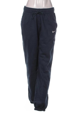 Dámské tepláky Nike, Velikost S, Barva Modrá, Cena  1 429,00 Kč