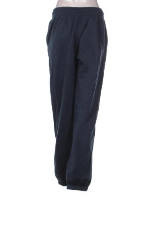 Dámské tepláky Nike, Velikost S, Barva Modrá, Cena  1 429,00 Kč