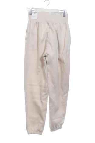 Damen Sporthose Nike, Größe XXS, Farbe Beige, Preis 61,99 €