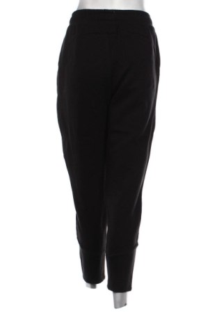 Γυναικείο αθλητικό παντελόνι PUMA, Μέγεθος L, Χρώμα Πολύχρωμο, Τιμή 21,00 €