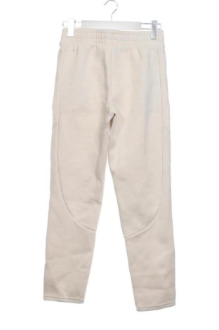 Γυναικείο αθλητικό παντελόνι PUMA, Μέγεθος XS, Χρώμα Εκρού, Τιμή 20,96 €