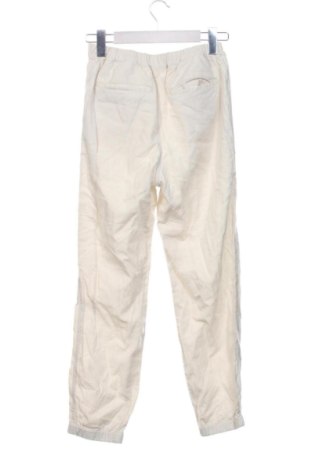 Dziecięce spodnie Uniqlo, Rozmiar 12-13y/ 158-164 cm, Kolor ecru, Cena 69,66 zł