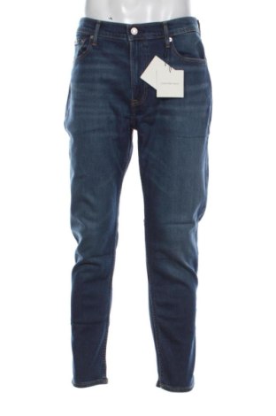 Pánske džínsy  Calvin Klein, Veľkosť S, Farba Modrá, Cena  103,95 €