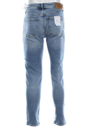 Męskie jeansy Calvin Klein Jeans, Rozmiar M, Kolor Niebieski, Cena 326,99 zł