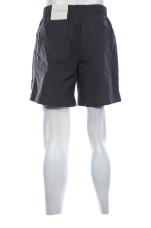 Herren Shorts Calvin Klein Jeans, Größe M, Farbe Grau, Preis 87,99 €