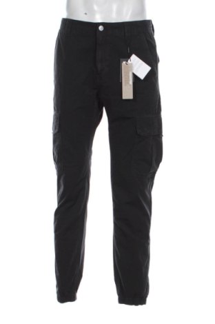 Pánské kalhoty  Tommy Jeans, Velikost M, Barva Černá, Cena  2 549,00 Kč