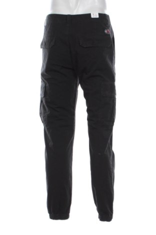 Pánské kalhoty  Tommy Jeans, Velikost M, Barva Černá, Cena  2 549,00 Kč