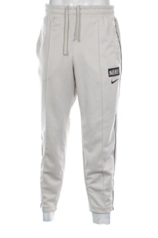 Pantaloni trening de bărbați Nike, Mărime L, Culoare Bej, Preț 261,29 Lei