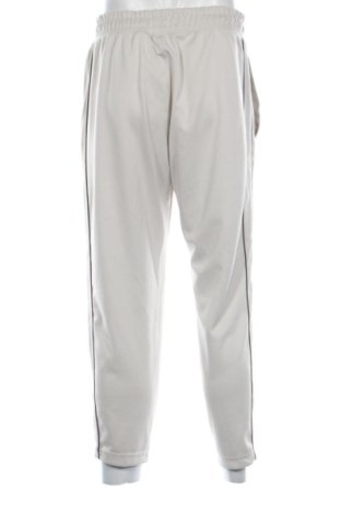 Pantaloni trening de bărbați Nike, Mărime L, Culoare Bej, Preț 261,29 Lei