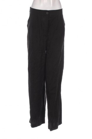 Damenhose Guido Maria Kretschmer for About You, Größe M, Farbe Schwarz, Preis 12,99 €, #131263791