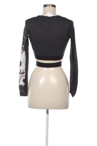 Γυναικεία μπλούζα Reebok, Μέγεθος XS, Χρώμα Πολύχρωμο, Τιμή 17,99 €