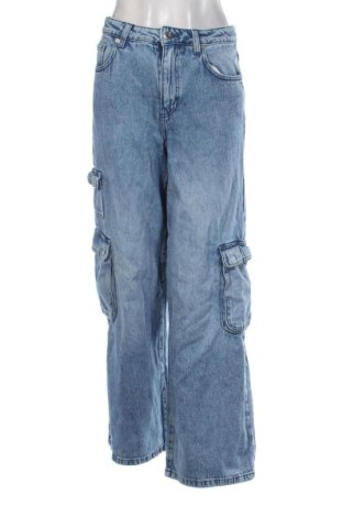 Damskie jeansy Clockhouse, Rozmiar M, Kolor Niebieski, Cena 80,38 zł