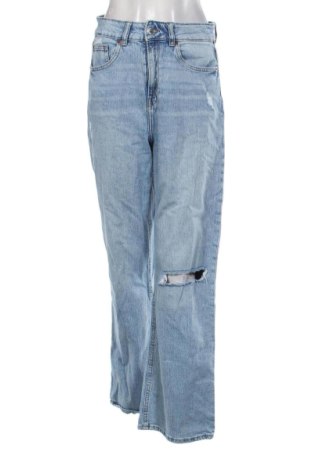 Damskie jeansy H&M, Rozmiar M, Kolor Niebieski, Cena 80,38 zł