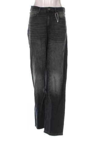 Damskie jeansy Weekday, Rozmiar M, Kolor Niebieski, Cena 88,99 zł