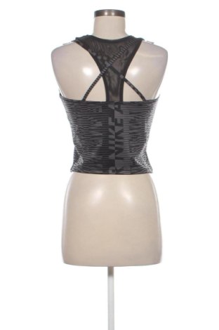 Γυναίκειο αθλητικό τοπ Nike, Μέγεθος M, Χρώμα Πολύχρωμο, Τιμή 19,99 €