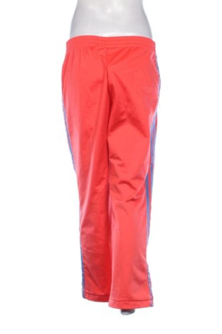 Damskie spodnie sportowe Adidas Originals, Rozmiar XL, Kolor Pomarańczowy, Cena 301,90 zł