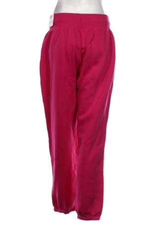 Damskie spodnie sportowe Nike, Rozmiar M, Kolor Różowy, Cena 250,99 zł