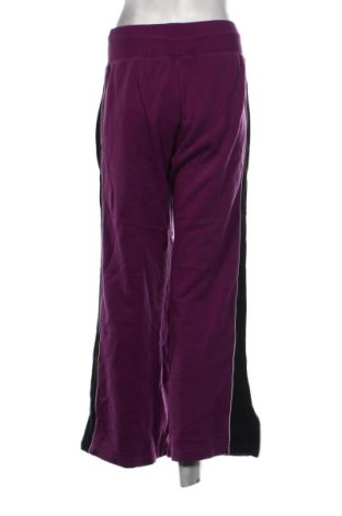 Damskie spodnie sportowe Nike, Rozmiar M, Kolor Kolorowy, Cena 110,99 zł