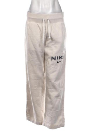 Damskie spodnie sportowe Nike, Rozmiar M, Kolor Beżowy, Cena 200,99 zł, #135902563
