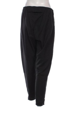 Γυναικείο αθλητικό παντελόνι Nike, Μέγεθος L, Χρώμα Μαύρο, Τιμή 56,99 €