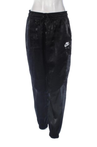 Damen Sporthose Nike, Größe L, Farbe Schwarz, Preis 46,13 €