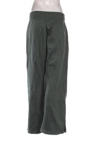 Дамско спортно долнище Nike, Размер L, Цвят Зелен, Цена 21,47 €