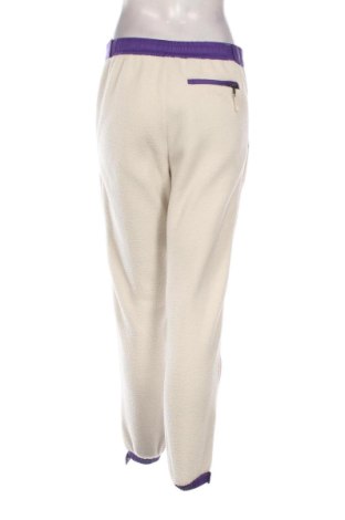 Damskie spodnie sportowe The North Face, Rozmiar S, Kolor ecru, Cena 187,55 zł