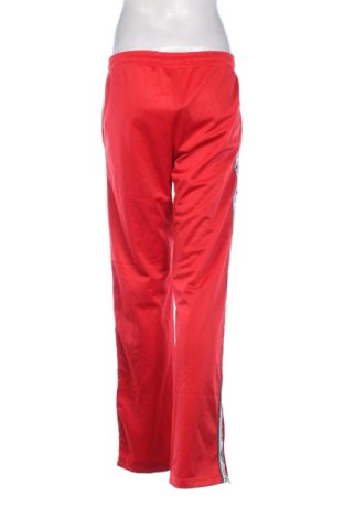 Дамско спортно долнище Umbro, Размер S, Цвят Червен, Цена 45,14 €