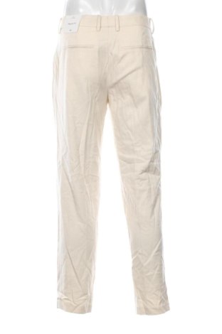 Męskie spodnie H&M, Rozmiar M, Kolor ecru, Cena 32,99 zł