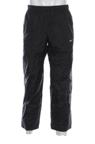 Męskie spodnie sportowe Nike, Rozmiar M, Kolor Czarny, Cena 131,57 zł