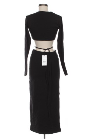 Φόρεμα UNFOLLOWED, Μέγεθος L, Χρώμα Μαύρο, Τιμή 117,99 €