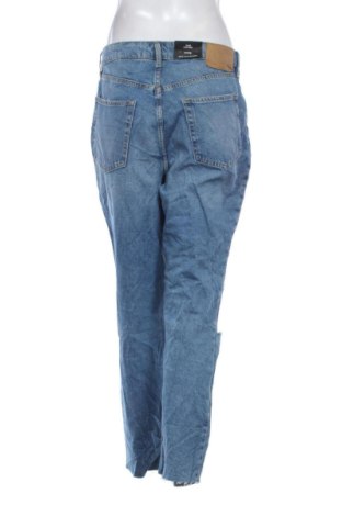 Damskie jeansy H&M Divided, Rozmiar L, Kolor Niebieski, Cena 60,99 zł