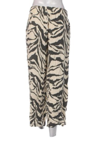 Damskie spodnie H&M, Rozmiar L, Kolor Kolorowy, Cena 78,99 zł