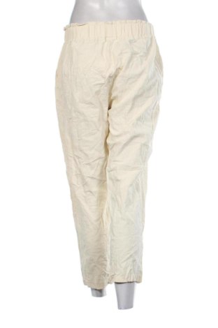 Női nadrág Unbranded, Méret M, Szín Ekrü
, Ár 2 889 Ft