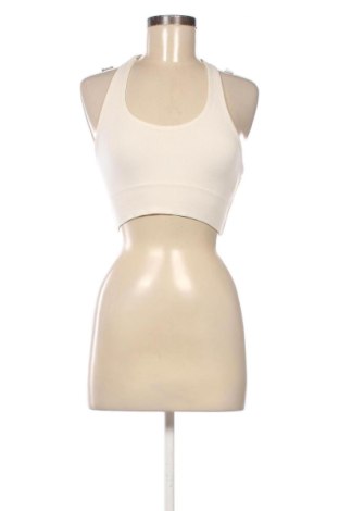 Damski sportowy top Unbranded, Rozmiar XS, Kolor ecru, Cena 31,86 zł