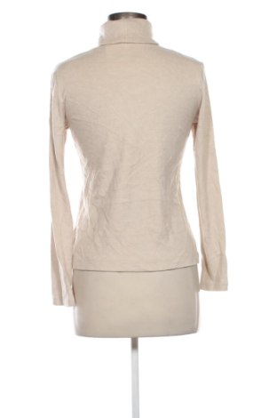 Дамско полo Uniqlo, Размер M, Цвят Бежов, Цена 7,15 €