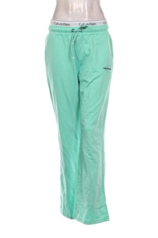 Дамско спортно долнище Calvin Klein, Размер L, Цвят Зелен, Цена 31,69 €