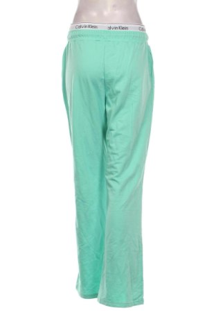 Дамско спортно долнище Calvin Klein, Размер L, Цвят Зелен, Цена 31,69 €